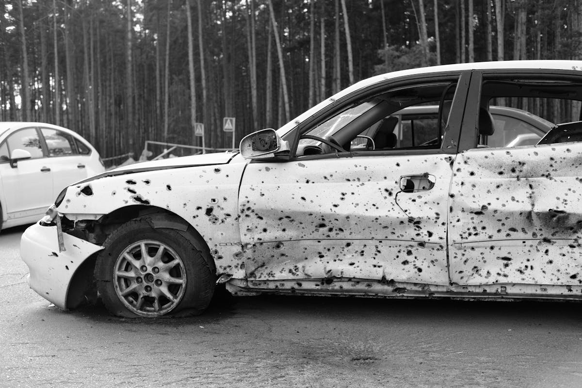 Abandoned Broken Car with Corrosion